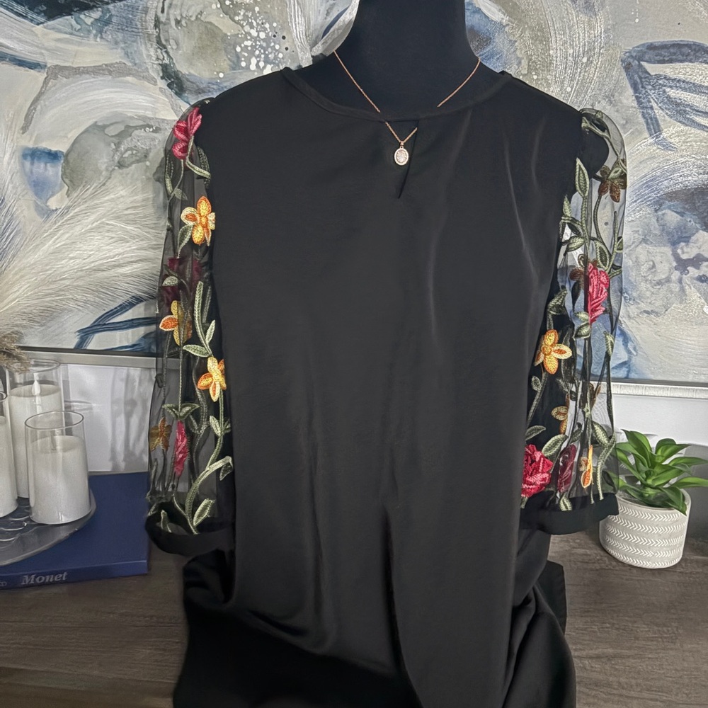 Elegant Black dress with Vibrant Floral Sleeves